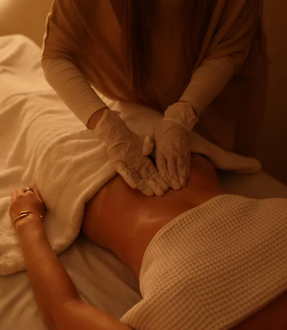 Therapist in gloves performing a European lymphatic drainage massage at LIMFAERA in Beverly Hills